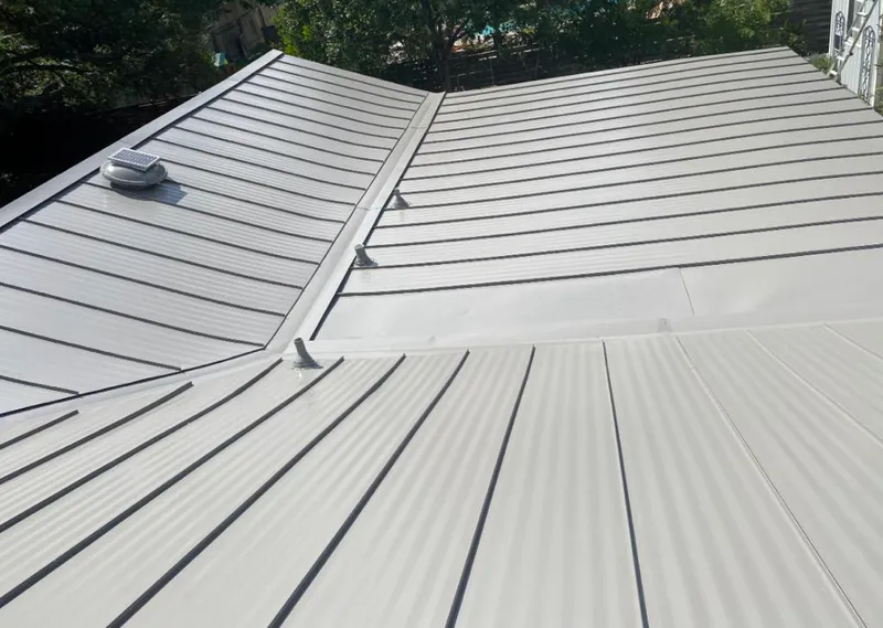 Solar attic fan installed on a metal roof for Roof Ventilation in San Carlos